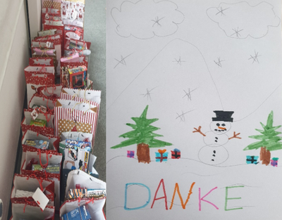 Teilnehmer*innen und ihre Kinder sagen Danke