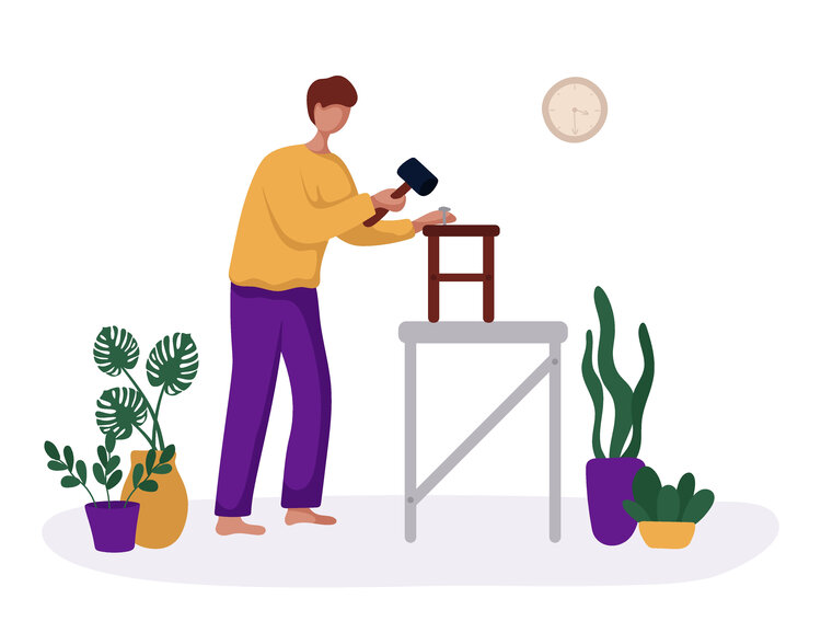 Junger Mann und sein Hobby oder seine tägliche Beschäftigung - er fertigt Kunsthandwerk mit seinen eigenen Händen an, in einer Werkstatt.