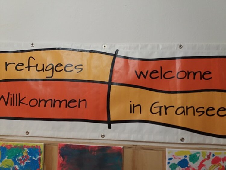 Begegnung von Flüchtlingen und Anwohnern Begegnung von Flüchtlingen und Anwohnern
